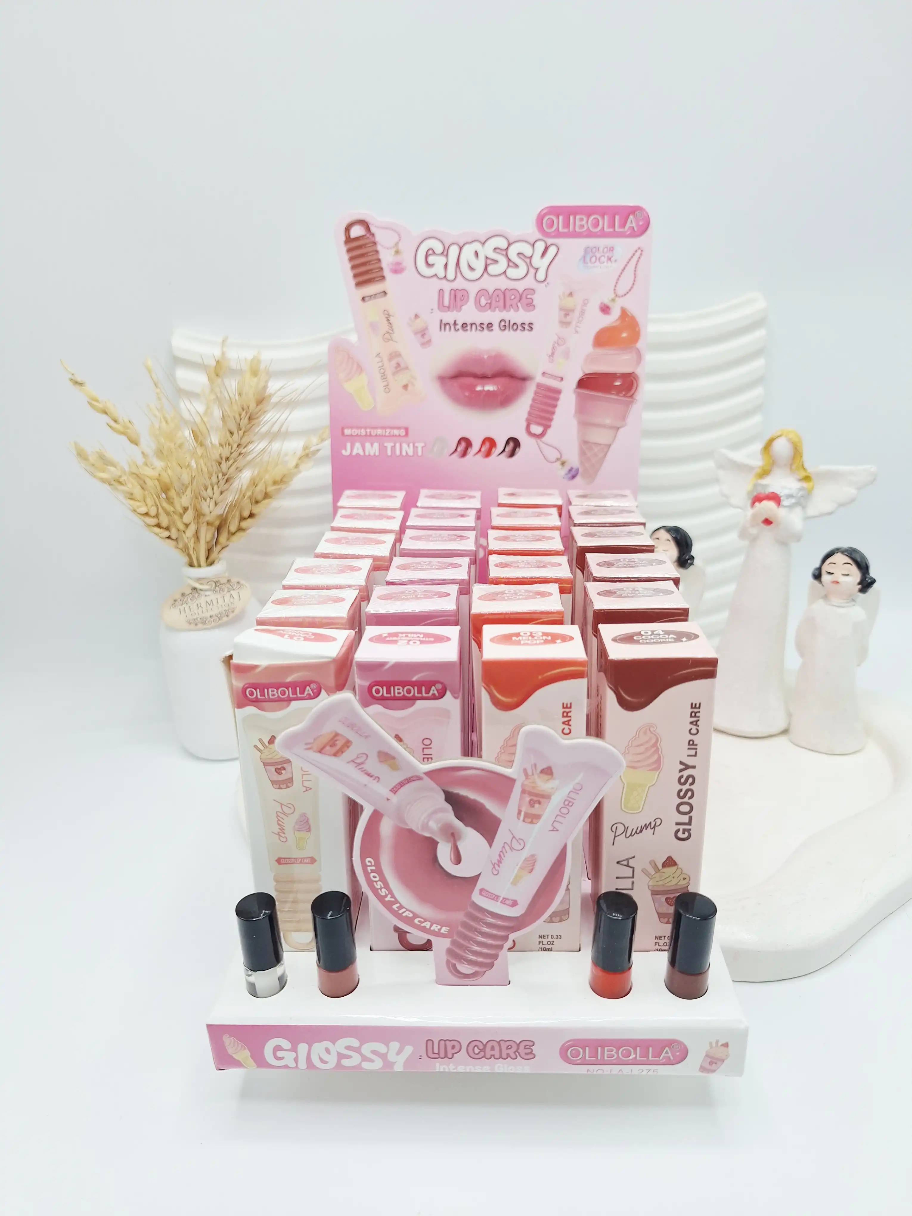 لیپ گلاس حجم دهنده کریستالی برند اولی بولا کد 275