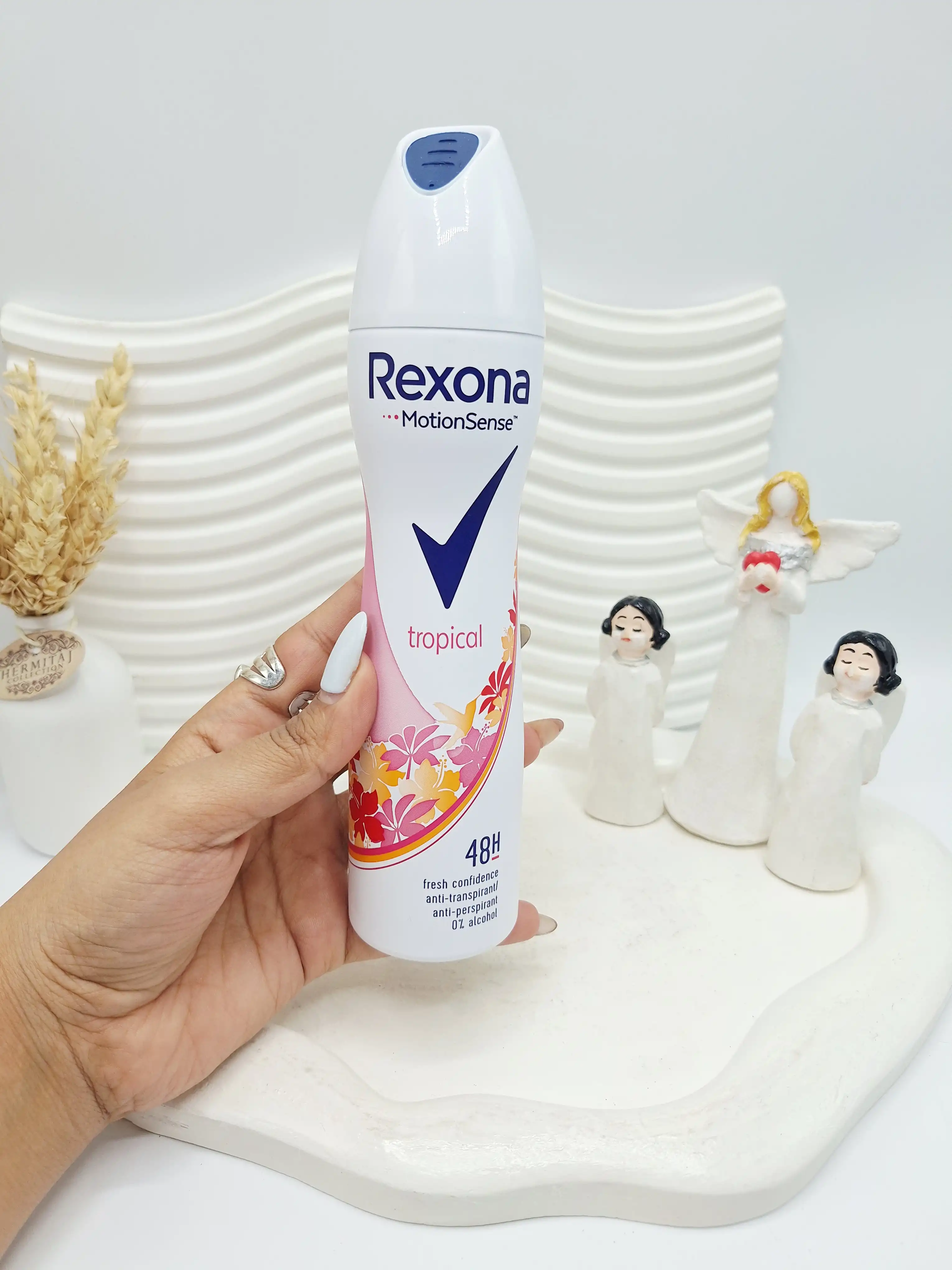 اسپری رکسونا زنانه مدل تروپیکال، رایحه میوه‌های استوایی و محافظت 48 ساعته کد ۲۲۲۲